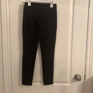 Aritzia TNA-low rise black leggings. US size XS.